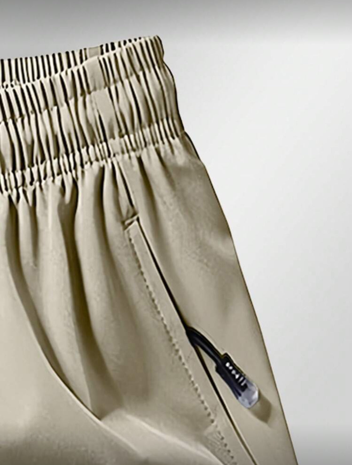 Pantalones cortos deportivos para hombres con bolsillo con cremallera anti-pérdida y cintura con cordón