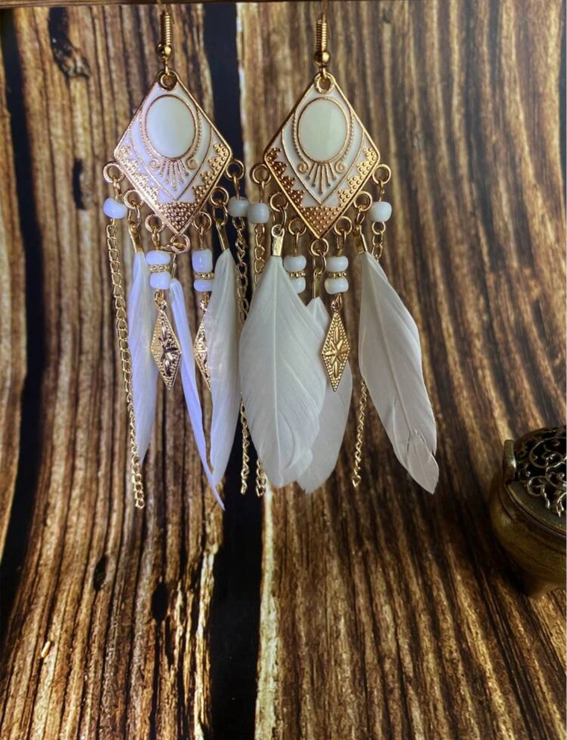 Pendientes largos pluma con fleco