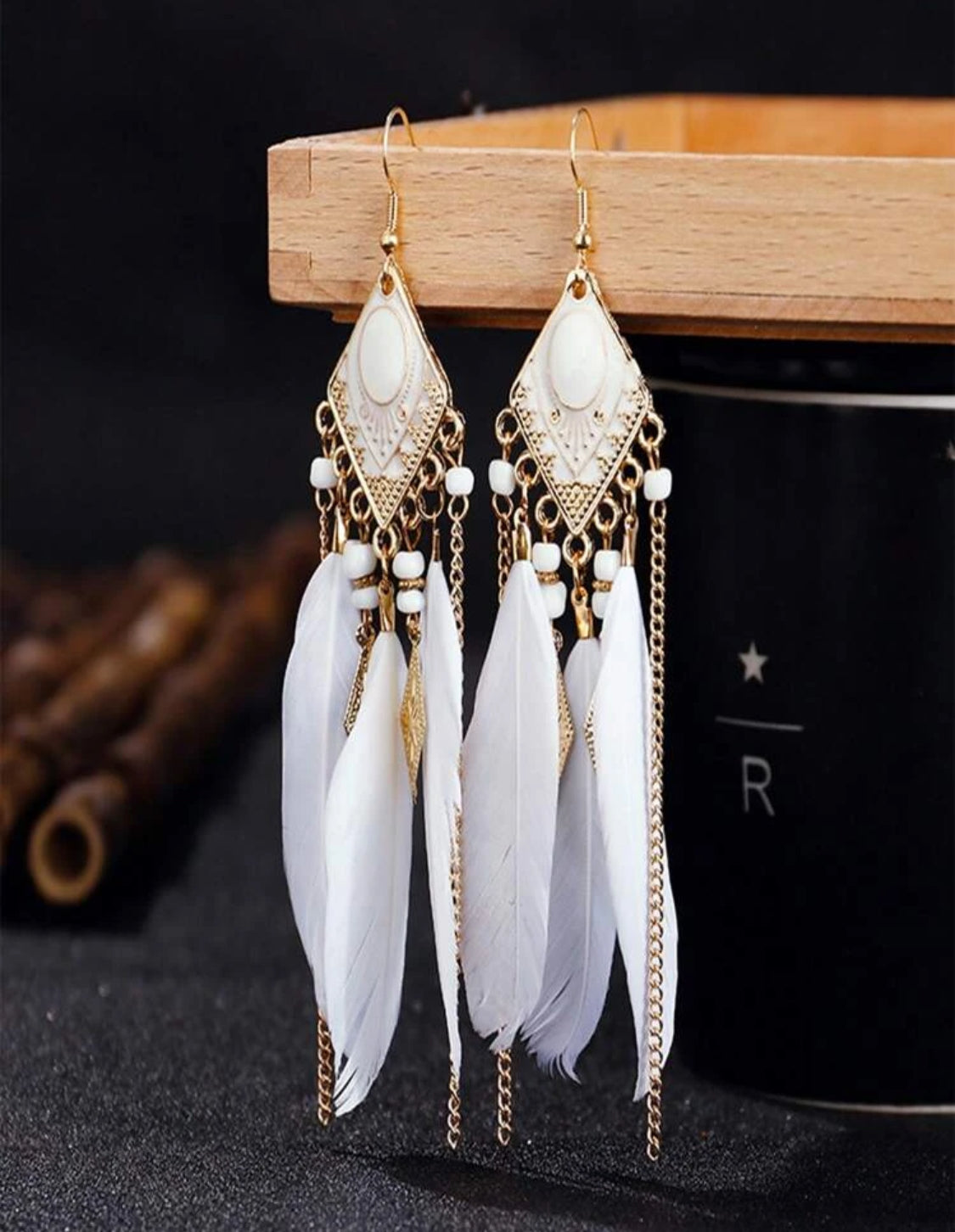 Pendientes largos pluma con fleco