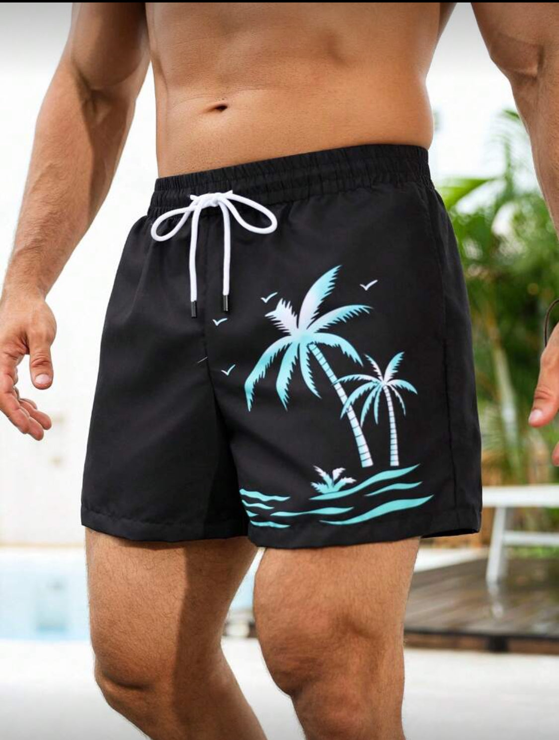 Manfinity Swimmode Shorts casuales de playa para hombres, con estampado de palmeras tropicales verdes, cintura elástica con cordón, pantalones de playa versátiles y de moda para el verano