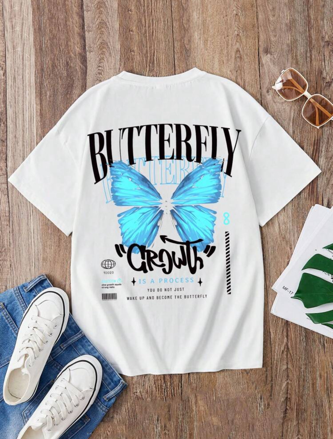 Remera Oversize SHEIN Camiseta gráfica con mariposa y eslogan para chicas adolescentes ModeFlare